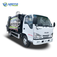 ISUZU 4x2 100P 6 CBM TS16949 Camion de compacteur de déchets d'assainissement 